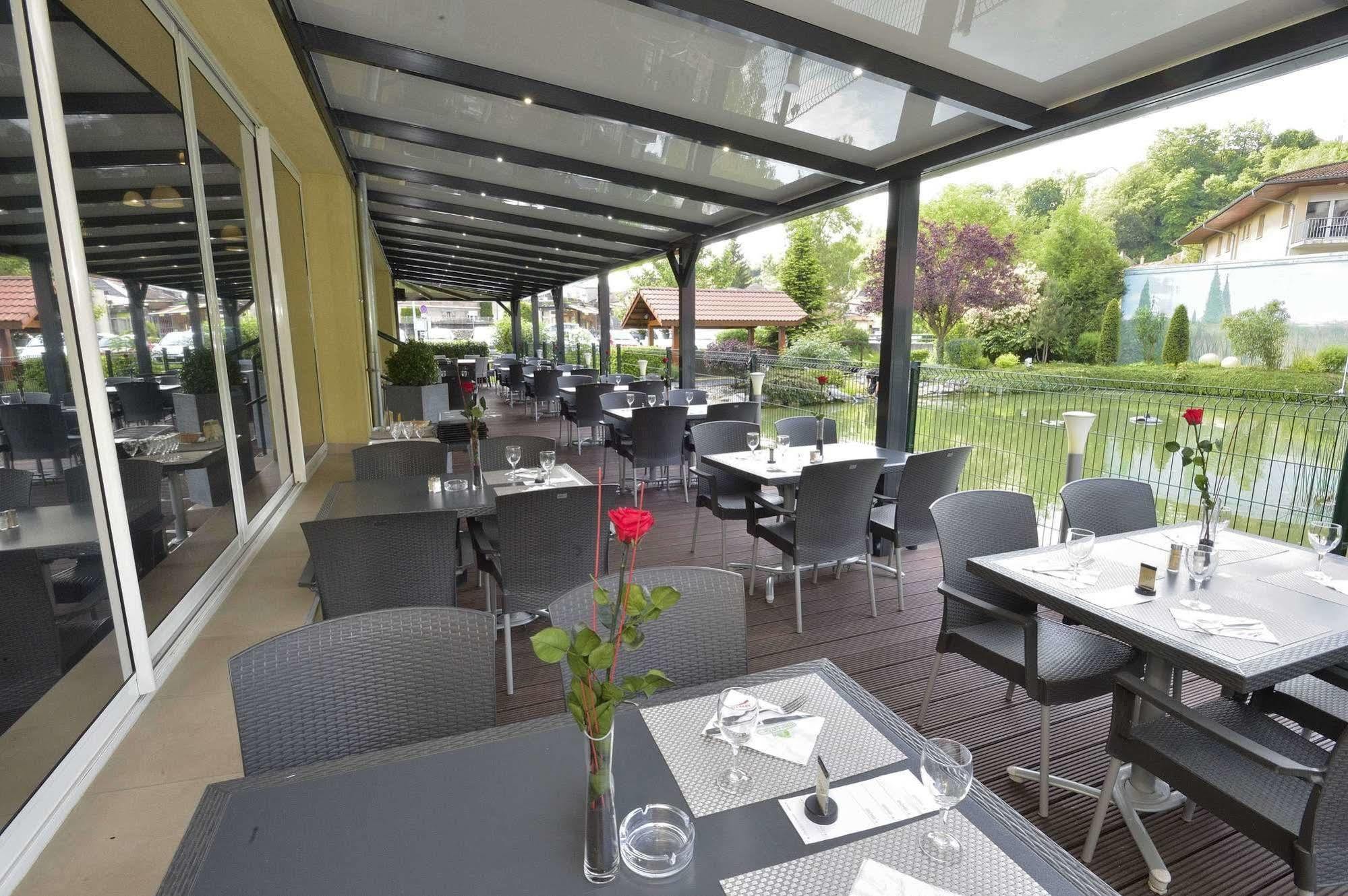 Hotel Aster Restaurant Aux Arcades Briey Esterno foto
